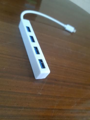 azercell modem satilir: Məhsul: Micro-USB girişli 4-port USB Hub Təsvir: - Smartfon, planşet — 2
