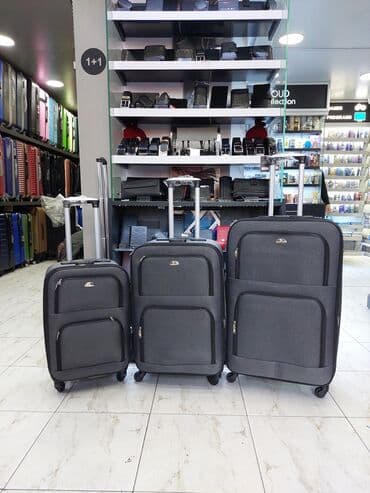 женские чемоданы из поликарбоната: S-45m. M-65m. L-95m Camadan satisi.Catdirilma ve temir.Magaza gece — 1