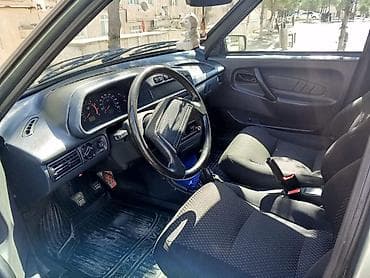 kia cerato satilir: Avtomobil: Lada Samara (VAZ 2114) — hetçbek gövdə tipi, boz rəng. Əsas — 7