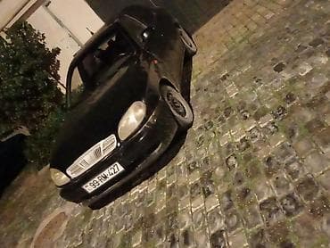 4 qapi niva satilir: Daewoo Lanos, qara rəng, sedan kuzov. 2010 il 1.5 mexanika 300-400 — 3