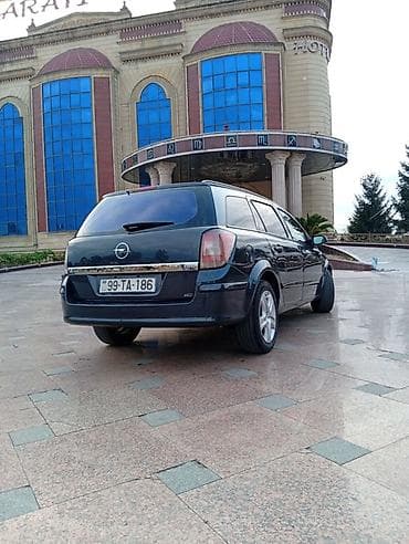 winda teker evi: Opel Astra H Caravan (universal kuzov) - Kuzov: universal, 5 qapı - — 9