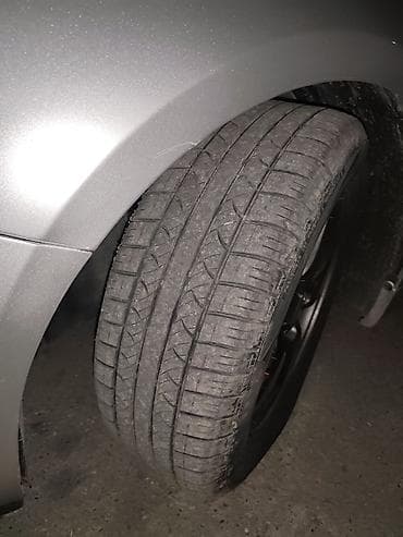 təkər satışı: Avtomobil təkəri satılır – universala uyğun yay/4 fəsil protektor — 4