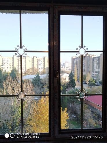 telefon ucun ekran şəkilləri: Plastik pəncərələrin və icərisində şəbəkələrin yıgılması hər rəngi var — 2