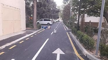 Asfalt işləri görülür.Həyətlərə yolları obyektləri — 2