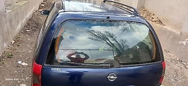 Opel: Opel Astra F Caravan (universal), tünd mavi rəng. - Kuzov: universal — 5