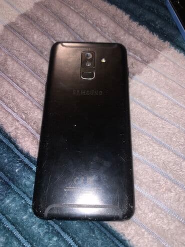 mi 12 t: Smartfon – qara rəngli, nazik korpus. Xüsusiyyətlər: - Sensorlu ekran — 7