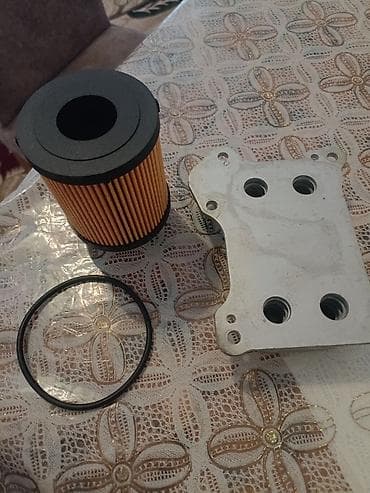 aluminum radiator: MGA 6512 yağ soyuducusu və yağ filtr dəsti Tərkibi: - Plitəli tip yağ — 3