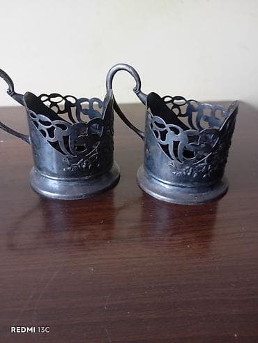 sufre: Məhsul: Metal fincanaltı (stəkan tutacağı) dəsti – 2 ədəd Təsvir: - — 2