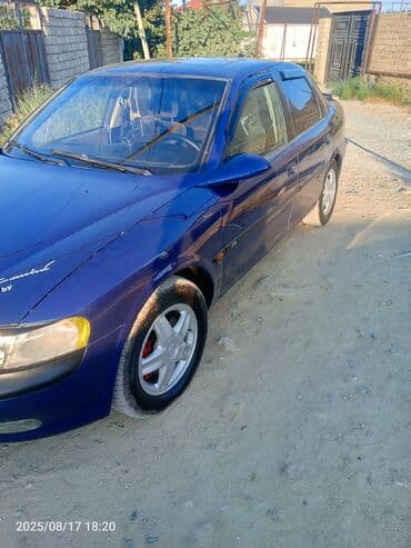 Su nəqliyyatı: Opel Vectra sedan – mavi rəng - Kuzov: 4 qapılı sedan, göy/mavi rəng — 1