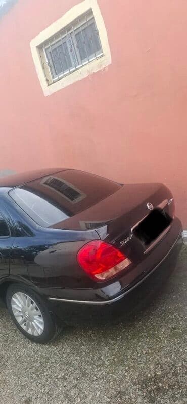 osram lampaları: Nissan Sunny sedan – geniş salonlu, komfortlu şəhər və uzun yol — 11