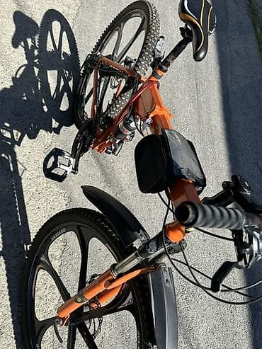 kirayə velosiped: Dağ velosipedi – tam asqılı, yığıla bilən gövdə, 26" təkərlər — 3