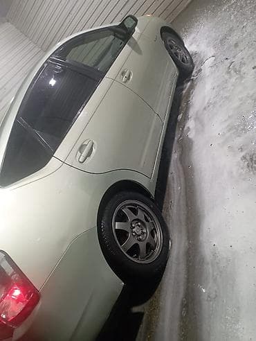 nasos teker dolduran: Toyota Prius (ikili güc sistemi – Hybrid Synergy Drive) — 3