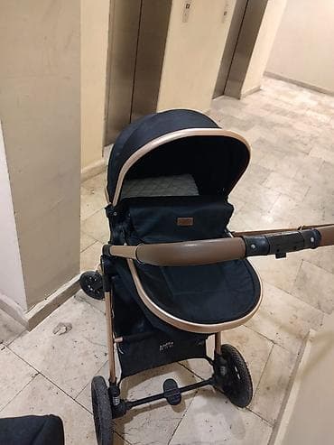 Çıxarıla bilən beşikli araba, Kidilo