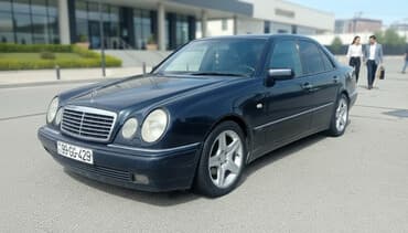 Mercedes-Benz E-Class (W210) sedan - Kuzov: 4 qapılı sedan, tünd mavi