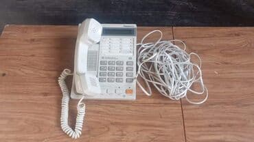 qabyuyan aliram: Stasionar telefon Panasonic, Simli, İşlənmiş, Ünvandan götürmə — 1