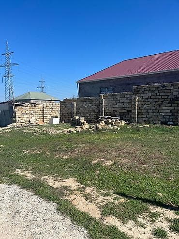 Satılır: tikinti üçün daş materialları və yarımçıq hasar komplekti