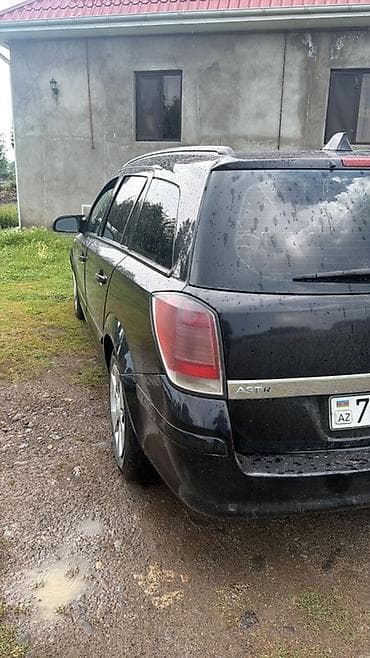 kia optima 2 sade mator: Opel Astra: 1.3 l | 2006 il Universal — 5