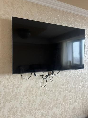 smart tv: Divara quraşdırılmış televizor - Təxmini ekran ölçüsü: 50–55 düym — 1