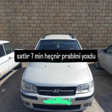 yeşqa maşın: Hyundai Matrix, ağ rəng, şəhərdaxili və ailə istifadəsi üçün praktik — 1