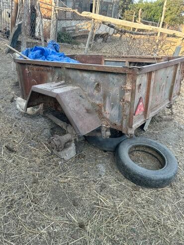 Yük daşımaq üçün nəzərdə tutulmuş metal kuzalı qoşqu. Paslı görünüşə lalafo.az -da Yük daşımaq üçün nəzərdə tutulmuş metal kuzalı qoşqu. Paslı görünüşə