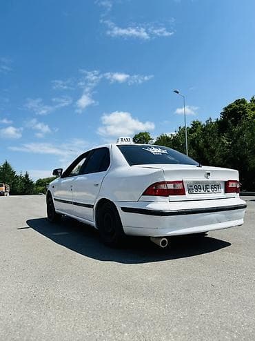 toy guzgusu: Saipa Saba (sedan) – ağ rəngdə, 4 qapılı, 5 yerlik şəhər sedanı — 3