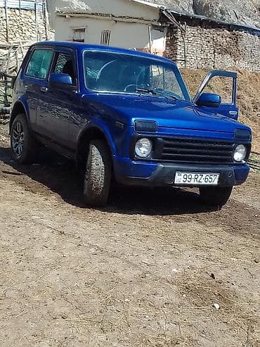 4 tekerlekli motor atv: VAZ (LADA) 4x4 Niva: 1.7 l | 1999 il 65843 km Ofrouder/SUV — 2