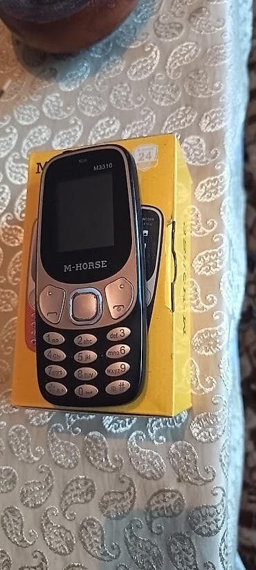 3 birinde printer: M-HORSE M3310 düyməli mobil telefon Xüsusiyyətlər: - Kompakt korpus — 1