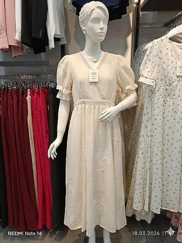 Zərif qadın donu – YaBao - Rəng: krem-ağ - Model: midi uzunluqda, V