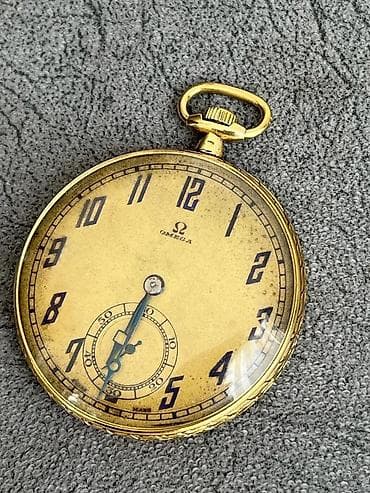 saad: Omega cib saatı – mexaniki, qurmalı - Brend və model: Omega (lövhədə — 1