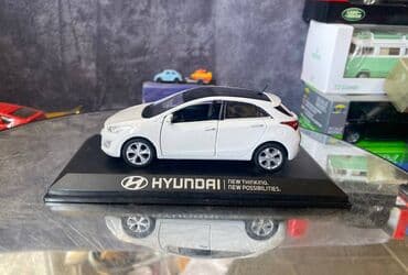 maşın modeli: Коллекционная модель Hyundai i30 5 door white 2012 Pino B&D Scale — 10