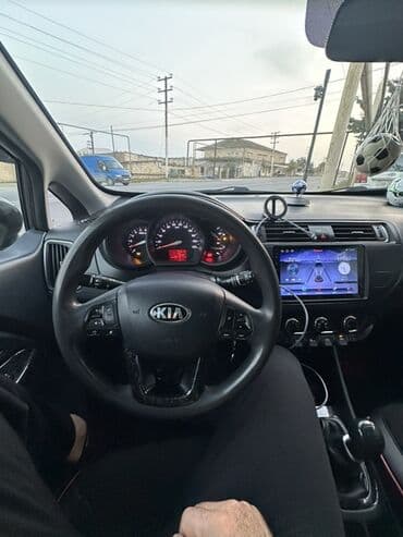 ceşqa maşını: Kia Rio: 1.1 l | 2014 il Hetçbek — 9