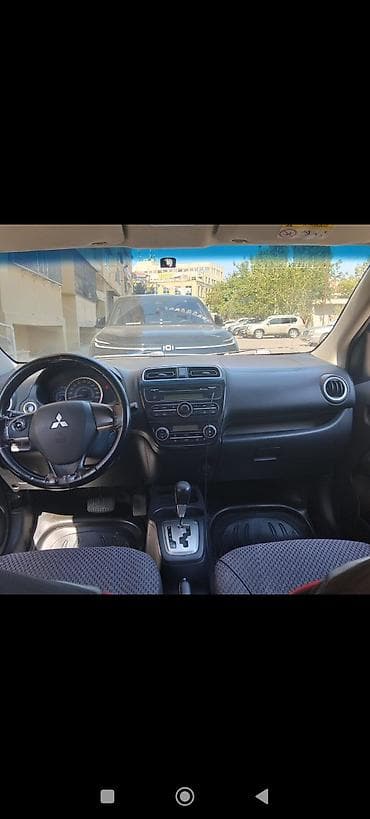 13 disk: Mitsubishi Attrage sedan - Kuzov: 4 qapılı sedan, tünd boz rəng - — 3