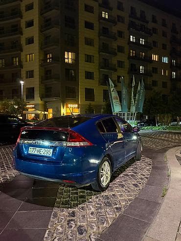Honda Insight: 1.3 л | 2013 г. Седан — 4