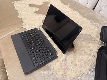 Digər noutbuklar və netbuklar: Microsoft Surface planşet-noutbuk hibridi Xüsusiyyətlər: - Ekran — 5