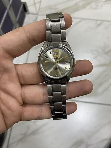 Смарт браслеты: Б/у, Наручные часы, Orient, цвет - Серебристый — 1