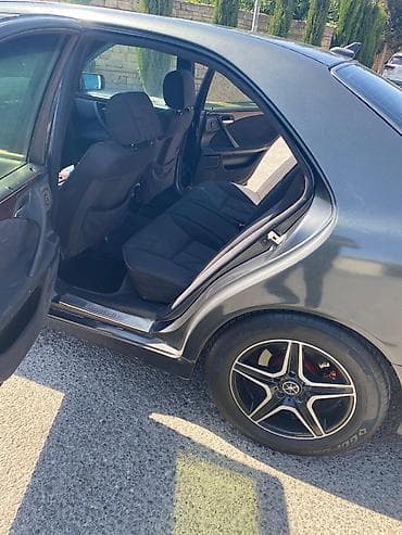03 masin: Mercedes-Benz E 230: 2.3 l | Sedan — 9