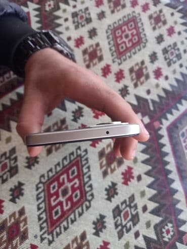 işlənməmiş telefonlar: Məhsul: Redmi smartfon Xüsusiyyətlər: - Korpus: düz kənarlı dizayn — 1