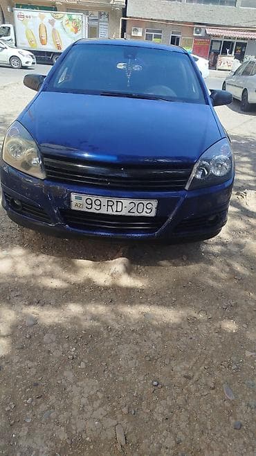 kia forte diffuser: Opel ASTRA 2004 il — 1