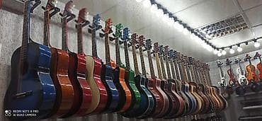 65 manatdan başlayan həvəskar, klassik və akustik gitaralar Rast