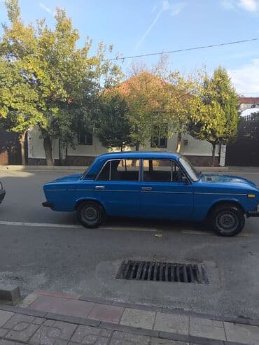 opel vectra b suret qutusu: VAZ 2106 sedan – mavi rəngdə, 4 qapı, klassik kuzov. Xüsusiyyətlər — 2