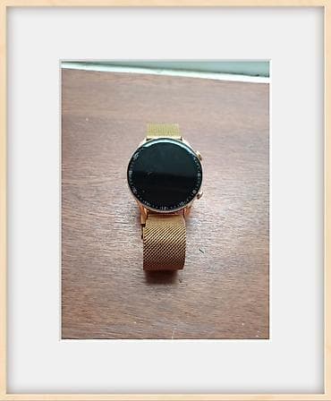 apple watch 1: Ağıllı saat dəsti - Qızılı rəngdə metal korpuslu, dairəvi ekranlı — 2