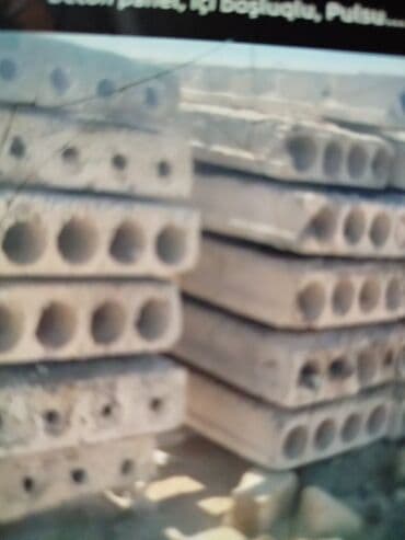 plitələr: Tikinti və ya təmir işləri üçün istifadə olunan beton plitələr. Bu — 6