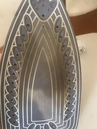 utu usdolu: Braun buxarlı ütü – 2200W Xüsusiyyətlər: - Güc: 2200W – sürətli — 2