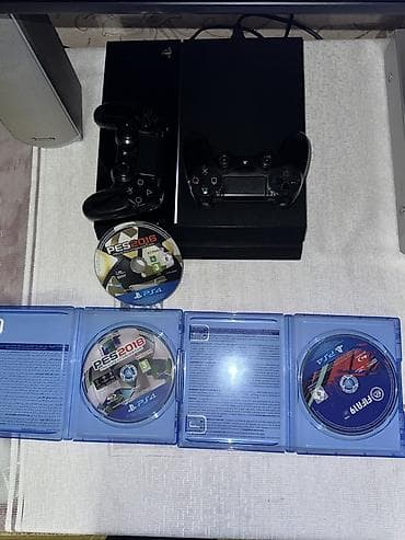rdr 2 disk: PlayStation 4 (PS4) komplekti usdunde 2 eded orjinal pult verilir — 4