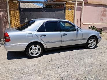 mercedes e class: Mercedes-Benz C-Sinfi (W202) sedan - Gümüşü rəng, 4 qapı, arxa — 6