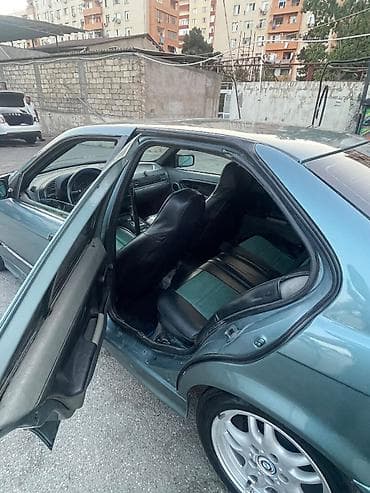 1994: BMW 3 series: 1.8 l | 1994 il Sedan — 4