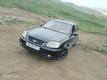 ij diski: Hyundai Accent sedan Xüsusiyyətlər: - Korpus: 4 qapılı sedan - Rəng — 3