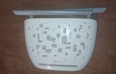 komputer işlənmiş: TP-Link Wi‑Fi router Xüsusiyyətlər: - Model: TP-Link (etiketdə — 1