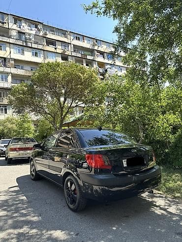 diskilər: Kia Rio: 1.4 l | 2008 il Sedan — 6
