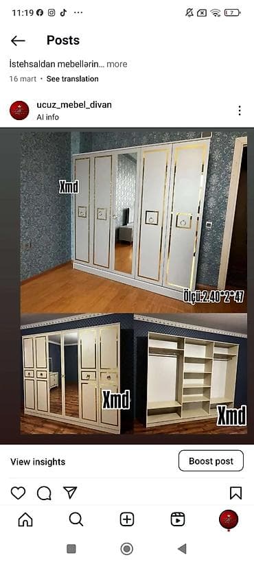 Ağ rəngdə, qızılı dekor xəttləri və mərkəzdə böyük güzgülü qapı ilə